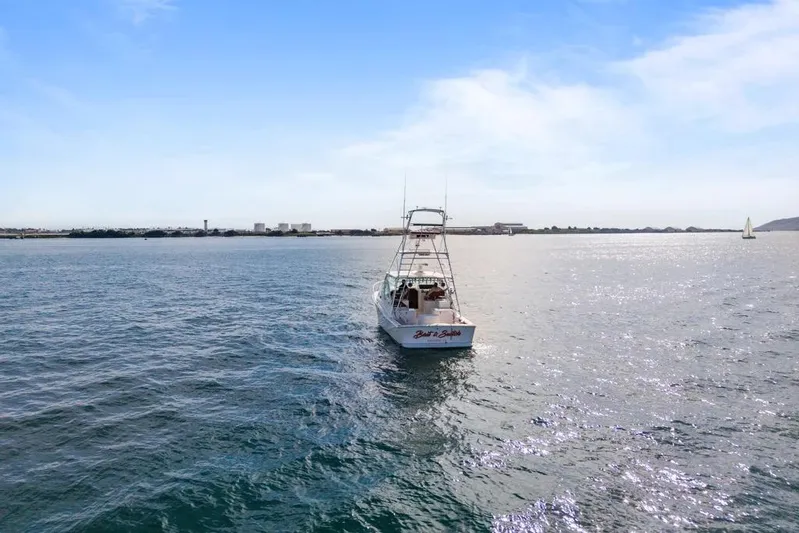 Gyro Stabilized Yacht Photos Pics 2005 Cabo 35 Express boat on open water under clear blue sky.