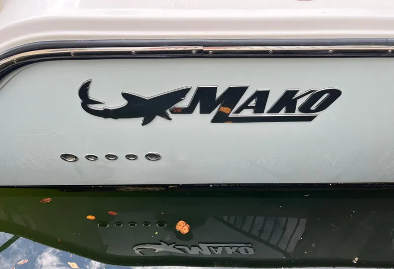 The Perfect Predator Yacht Photos Pics 2017 Mako 414 CC Bluewater Family Edition boat logo on hull.