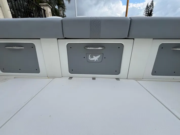 The Perfect Predator Yacht Photos Pics 2017 Mako 414 CC Bluewater Family Edition boat seating and storage area.