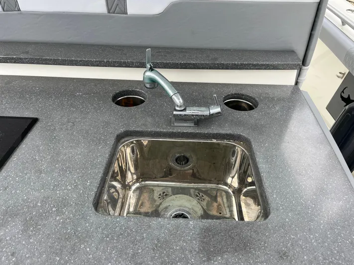 The Perfect Predator Yacht Photos Pics Stainless steel sink and faucet on Mako 414 CC Bluewater Family Edition boat, 2017 model.