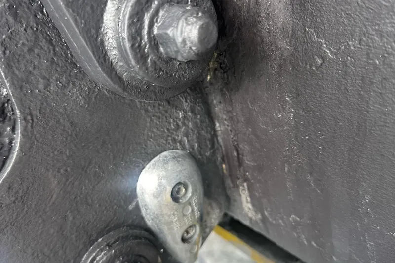 Beach House Yacht Photos Pics Close-up of a 2010 Sea Ray 450 Sundancer boat's metal components and bolts.