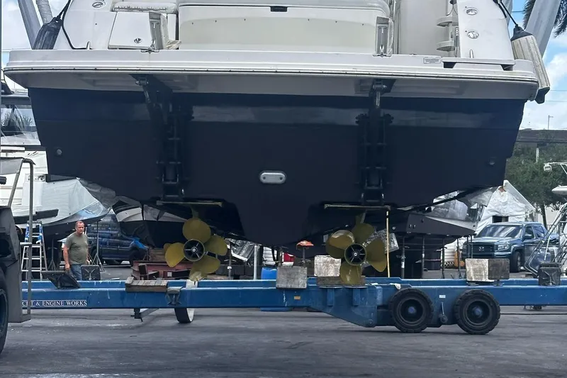 Beach House Yacht Photos Pics 2010 Sea Ray 450 Sundancer yacht on trailer, showcasing dual propellers.