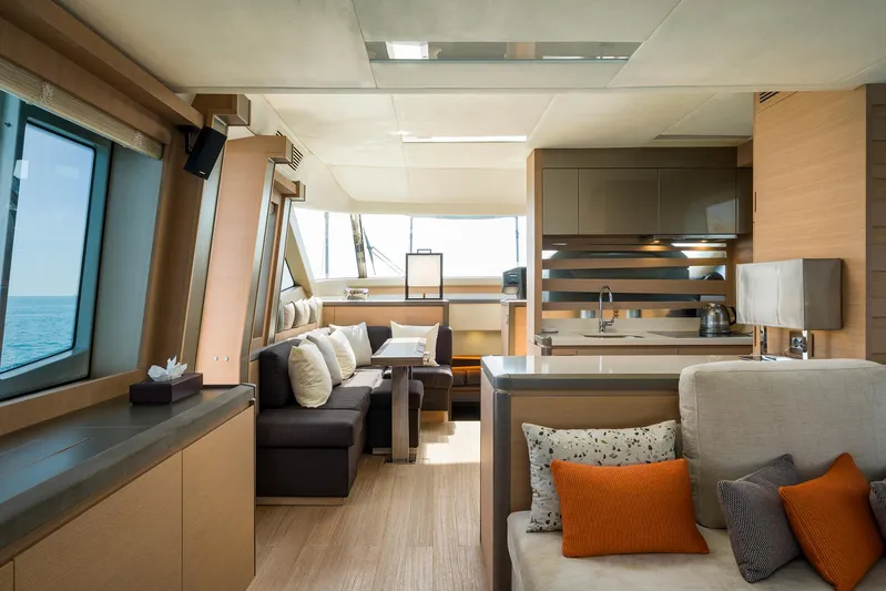 Crazy Diamond Yacht Photos Pics Luxurious interior of 2016 Monte Carlo Yachts MCY 70 with modern kitchen and seating area.