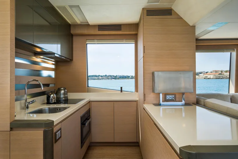 Crazy Diamond Yacht Photos Pics Modern kitchen interior of 2016 Monte Carlo Yachts MCY 70 with ocean view.