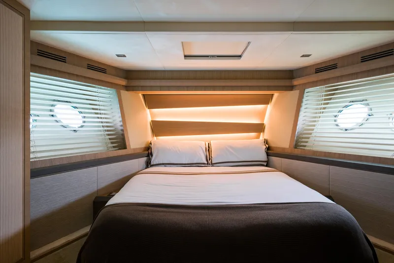 Crazy Diamond Yacht Photos Pics Luxurious bedroom interior of 2016 Monte Carlo Yachts MCY 70 with modern lighting.