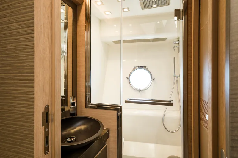 Crazy Diamond Yacht Photos Pics Luxurious bathroom on the 2016 Monte Carlo Yachts MCY 70 with modern fixtures.