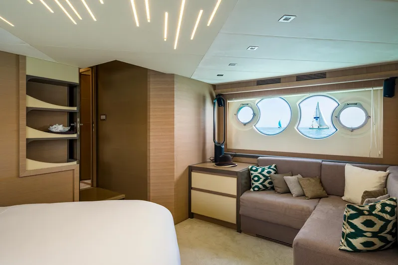 Crazy Diamond Yacht Photos Pics Luxurious interior of 2016 Monte Carlo Yachts MCY 70 with modern design and porthole windows.
