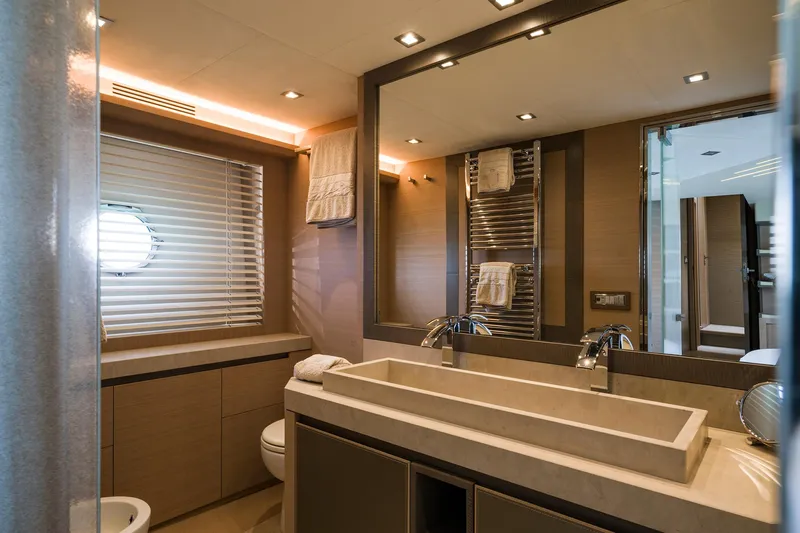 Crazy Diamond Yacht Photos Pics Luxurious bathroom in 2016 Monte Carlo Yachts MCY 70 with modern fixtures and double sinks.