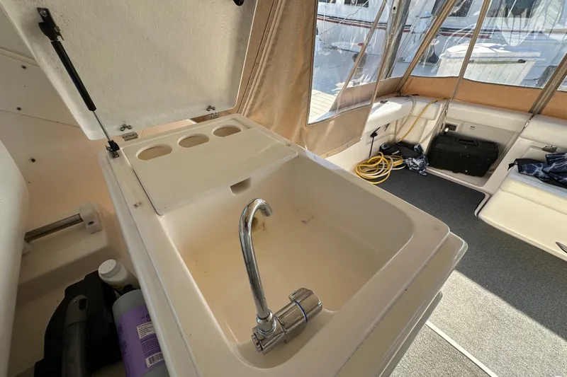 Yacht Photos Pics 2001 Tiara Yachts 3500 Open interior with sink and faucet in cabin area.