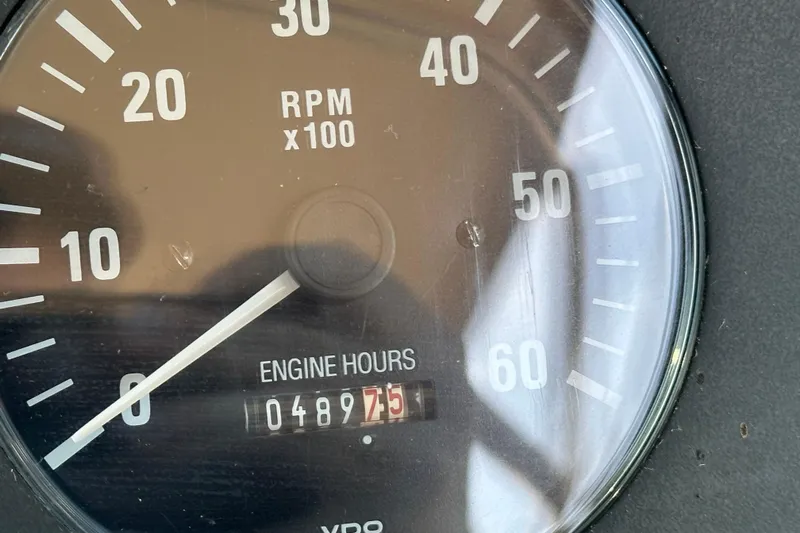  Yacht Photos Pics Close-up of Tiara Yachts 3500 Open 2001 tachometer showing 489.75 engine hours.