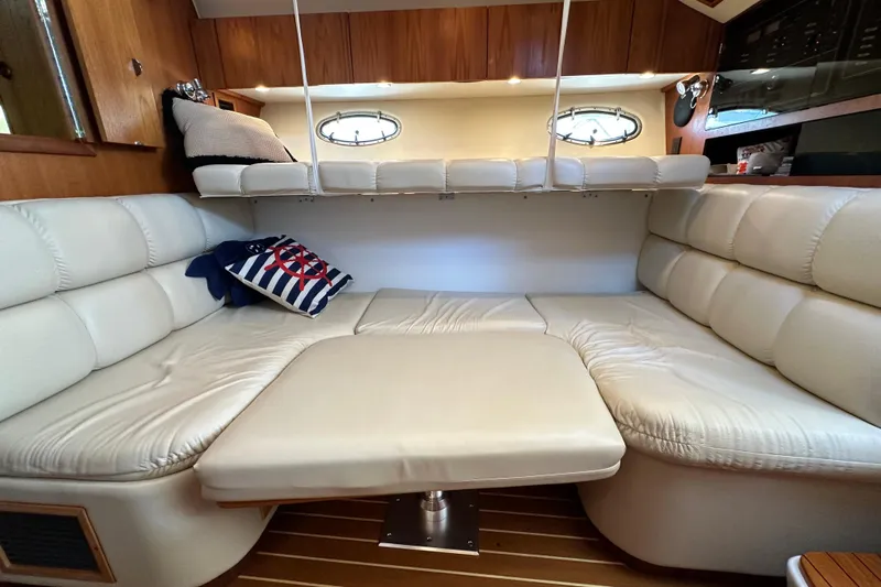  Yacht Photos Pics Interior of 2001 Tiara Yachts 3500 Open with plush seating and nautical decor.