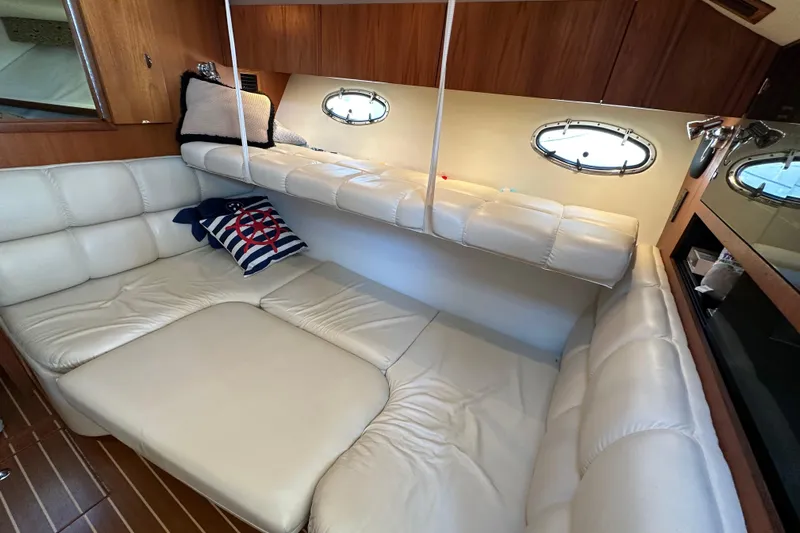  Yacht Photos Pics 2001 Tiara Yachts 3500 Open cabin with plush seating and nautical decor.