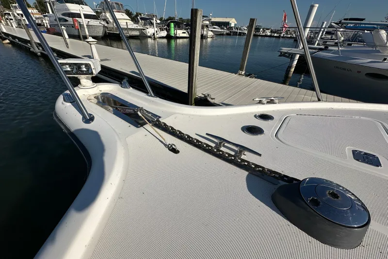  Yacht Photos Pics Bow of 2001 Tiara Yachts 3500 Open at marina, showcasing anchor chain and deck details.