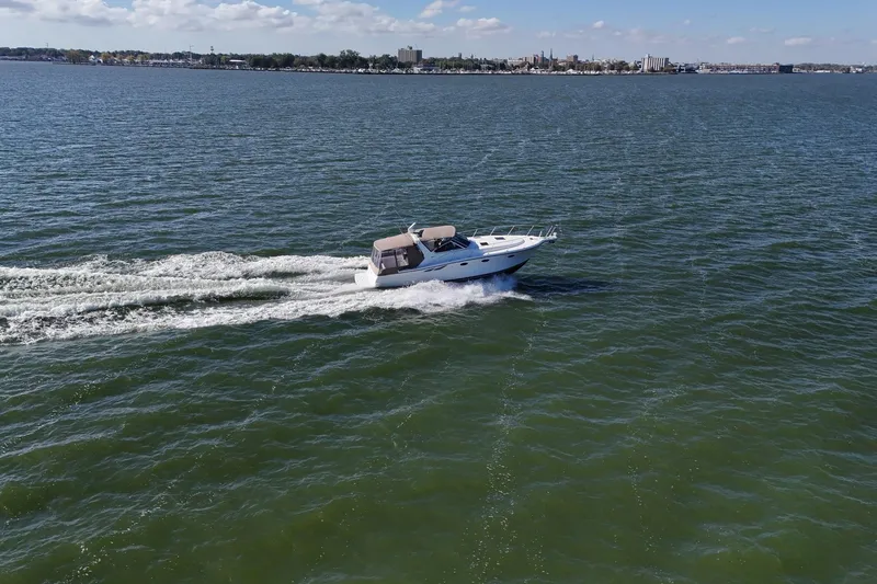  Yacht Photos Pics 2001 Tiara Yachts 3500 Open cruising on a sunny day in open waters.