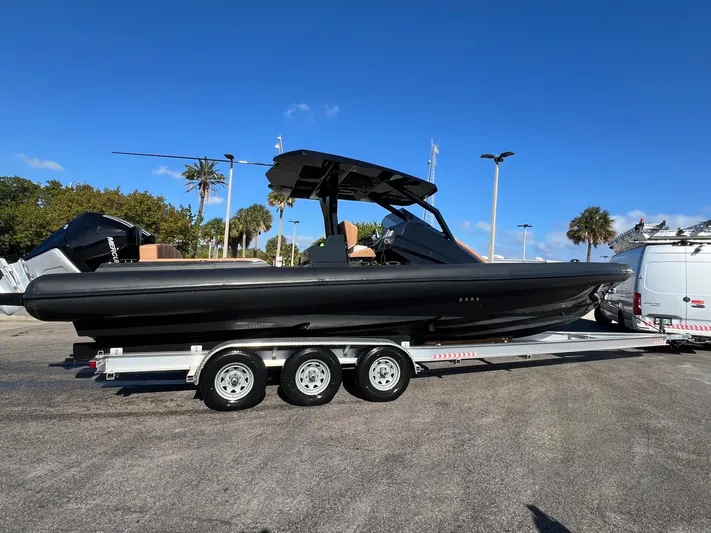 Novielli Yacht Photos Pics 2026 Novielli Veloche 349 boat on trailer under clear blue sky.