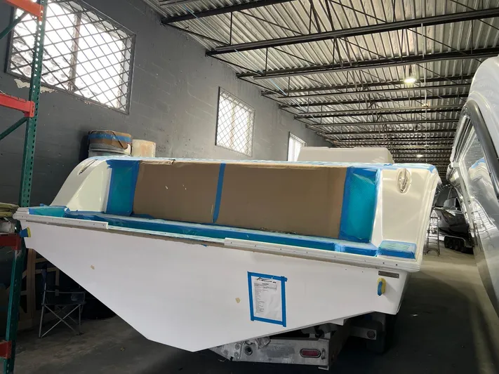  Yacht Photos Pics Streamline 45 boat, 2026 model, in a warehouse under construction or maintenance.