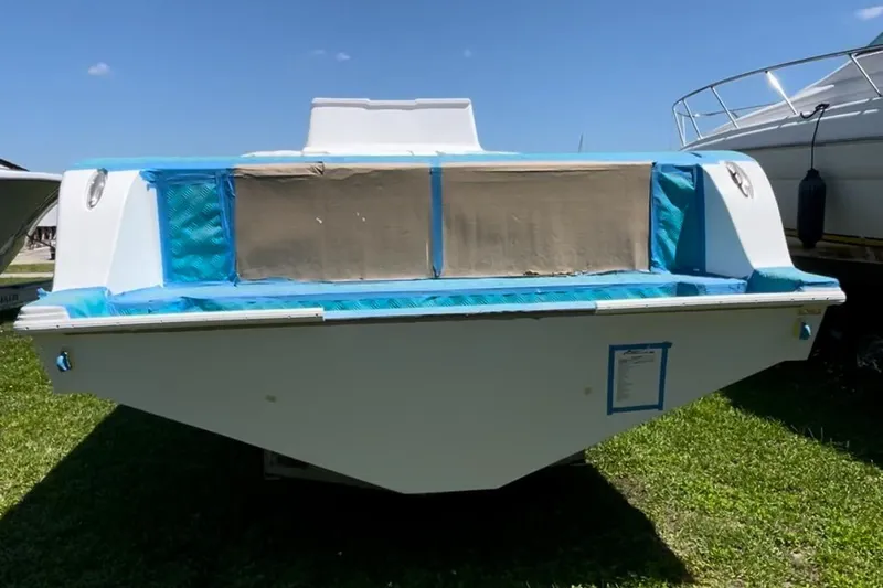  Yacht Photos Pics Streamline 45 boat, 2026 model, rear view on grass under clear blue sky.