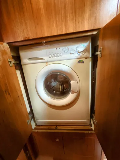 Rafel Yacht Photos Pics Washing machine in wooden cabinet on Hunter 45 Center Cockpit 2006.