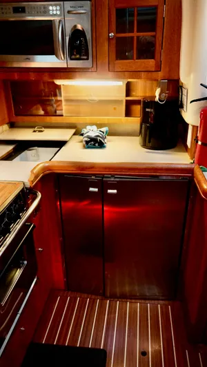 Rafel Yacht Photos Pics Galley area of a 2006 Hunter 45 Center Cockpit yacht.