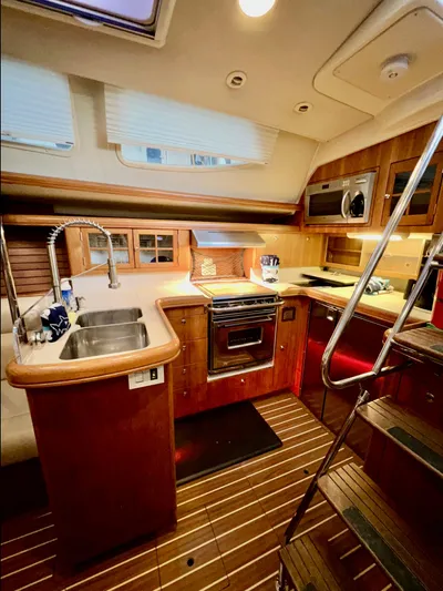 Rafel Yacht Photos Pics Interior of 2006 Hunter 45 Center Cockpit yacht kitchen.