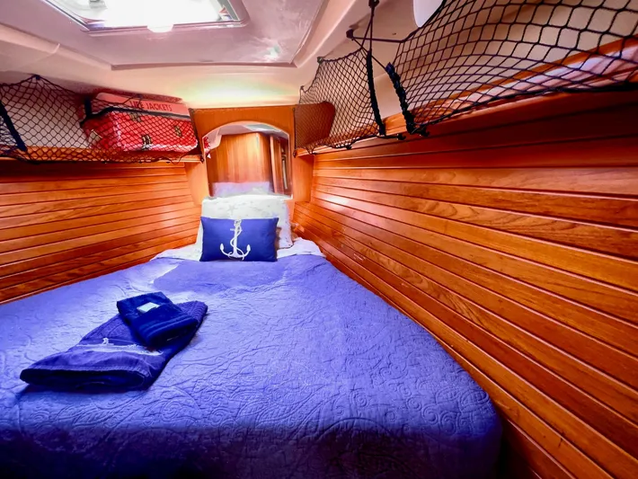 Rafel Yacht Photos Pics Cozy cabin in a 2006 Hunter 45 Center Cockpit yacht.