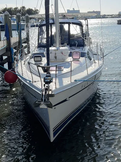 Rafel Yacht Photos Pics Hunter 45 Center Cockpit sailboat, 2006 model, docked at harbor.