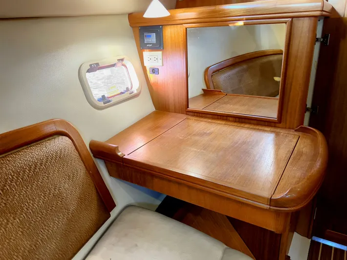Rafel Yacht Photos Pics Interior of 2006 Hunter 45 Center Cockpit with wooden desk and mirror.