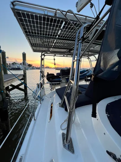 Rafel Yacht Photos Pics Hunter 45 Center Cockpit 2006 at sunset in harbor.