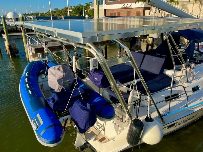 Rafel Yacht Photos Pics Hunter 45 Center Cockpit 2006 with dinghy and solar panel.