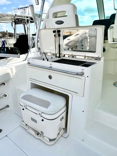  Yacht Photos Pics 2011 Boston Whaler 345 Conquest boat interior with seating and storage.