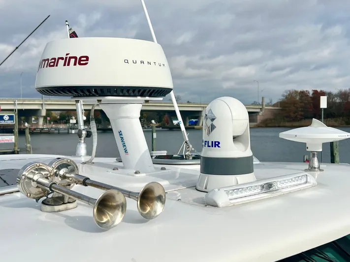  Yacht Photos Pics Boston Whaler 345 Conquest 2011 boat electronics and radar equipment on deck.