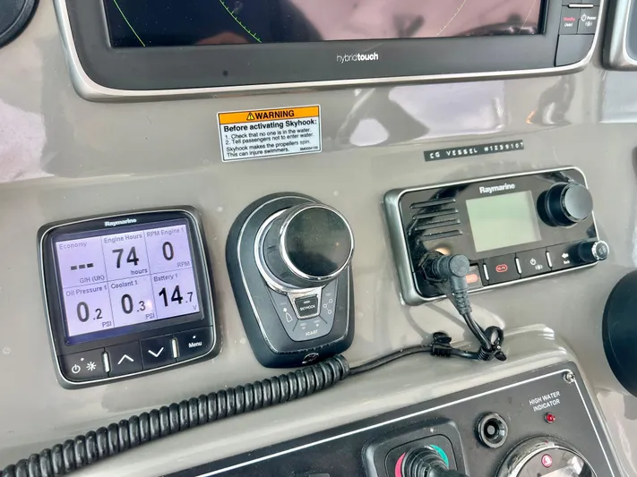  Yacht Photos Pics Control panel of a 2011 Boston Whaler 345 Conquest boat with navigation instruments.