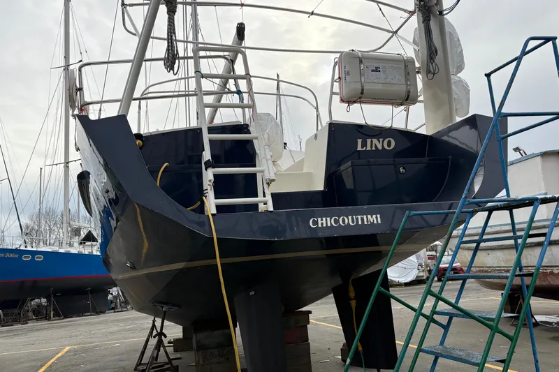 Lino Yacht Photos Pics 2019 Chatam Extreme 42 sailboat in dry dock, featuring a sleek navy hull.