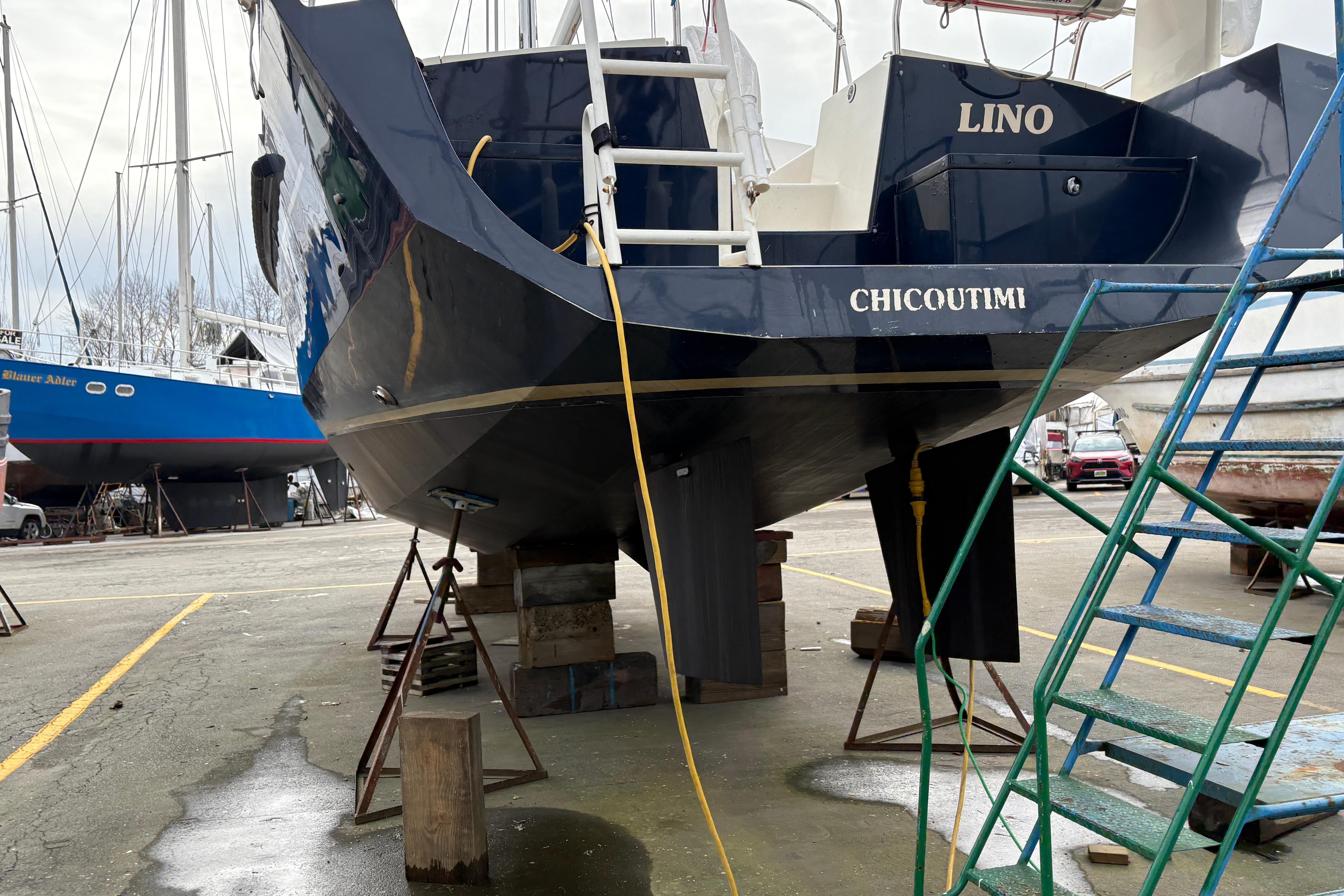 2019 Chatam Extreme 42 sailboat in dry dock, Chicoutimi, with blue hull and ladder access.