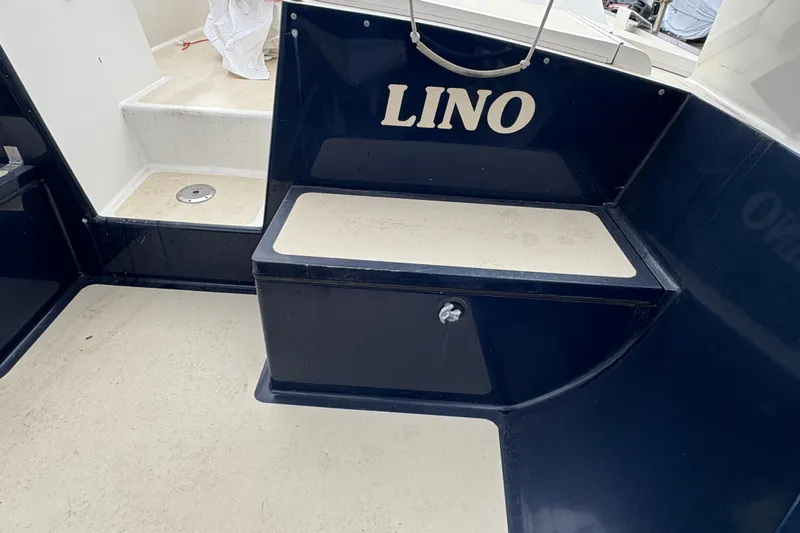 Lino Yacht Photos Pics 2019 Chatam Extreme 42 boat interior with "LINO" text on dark panel.