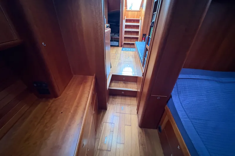 Lino Yacht Photos Pics Interior of 2019 Chatam Extreme 42 yacht with wooden flooring and cozy cabin.