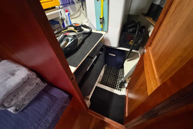 Lino Yacht Photos Pics Interior of 2019 Chatam Extreme 42, featuring storage area with tools and equipment.