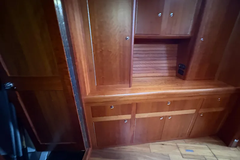 Lino Yacht Photos Pics Wooden interior cabinetry of 2019 Chatam Extreme 42 yacht, featuring ample storage space.