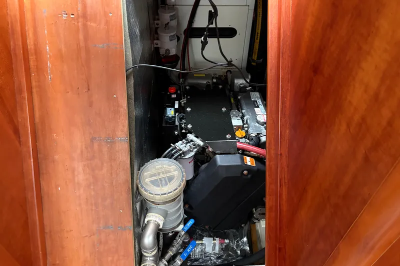 Lino Yacht Photos Pics Engine compartment of 2019 Chatam Extreme 42 yacht, showcasing mechanical components and wiring.