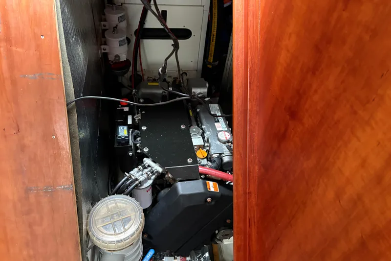 Lino Yacht Photos Pics Engine compartment of 2019 Chatam Extreme 42 yacht, showcasing mechanical components and wiring.