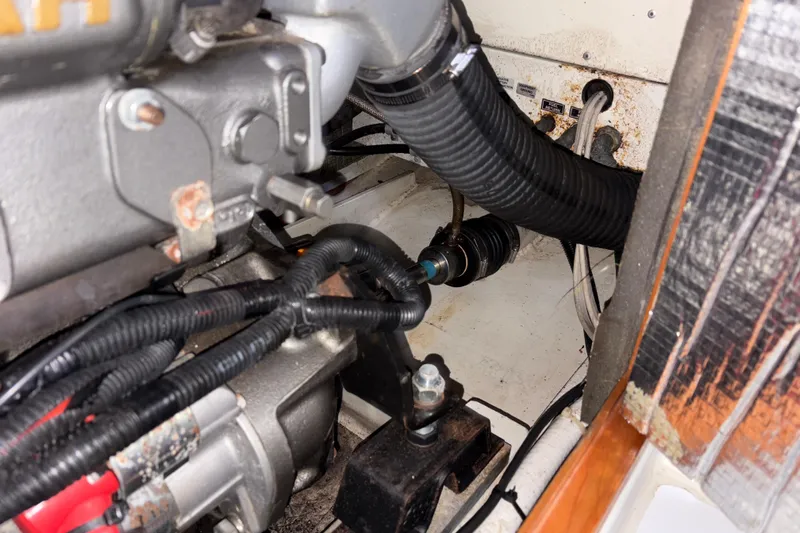 Lino Yacht Photos Pics Engine compartment of 2019 Chatam Extreme 42 with visible hoses and components.