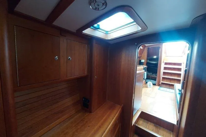 Lino Yacht Photos Pics Interior of 2019 Custom Chatam Extreme 42 yacht with wooden cabinetry and skylight.