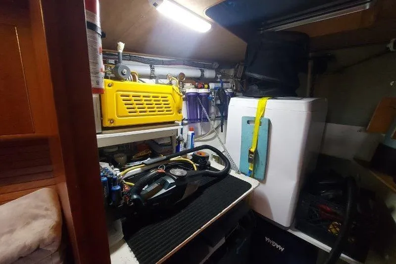 Lino Yacht Photos Pics Engine room of 2019 Custom Chatam Extreme 42 with equipment and storage.