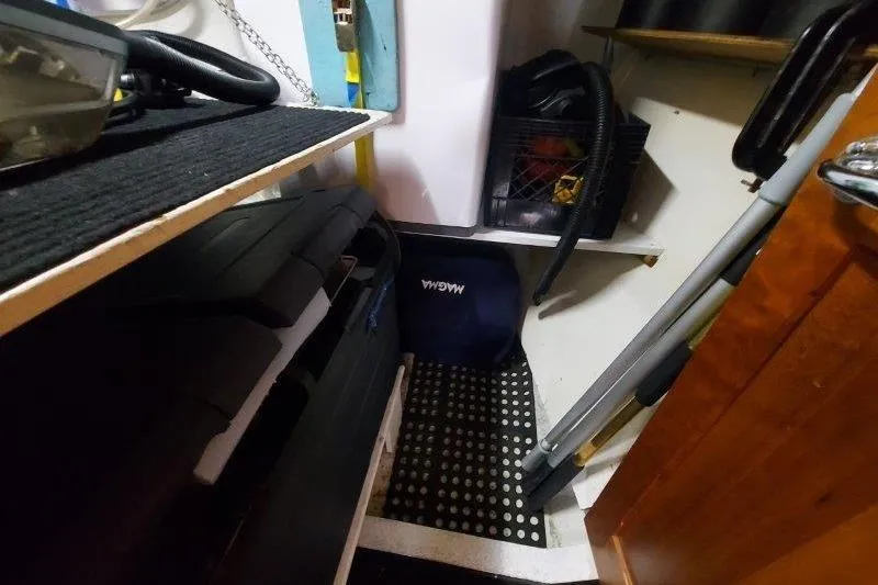 Lino Yacht Photos Pics Storage area inside a 2019 Custom Chatam Extreme 42 boat with organized equipment.