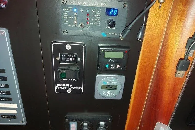 Lino Yacht Photos Pics Control panel of a 2019 Custom Chatam Extreme 42 with various electronic displays and switches.