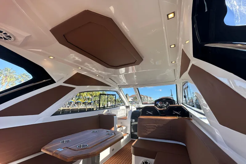  Yacht Photos Pics Interior of 2025 NX Boats 370, featuring sleek design and luxurious seating.