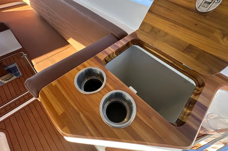  Yacht Photos Pics Luxury wooden boat interior with cup holders and storage, NX Boats 370, 2025 model.