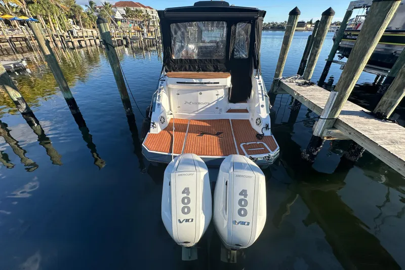  Yacht Photos Pics 2025 NX Boats 370 with twin Mercury 400 V10 engines docked at marina.
