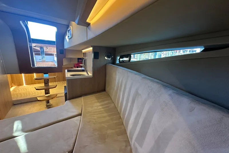  Yacht Photos Pics Luxurious interior of 2025 NX Boats 370, featuring modern seating and sleek design elements.