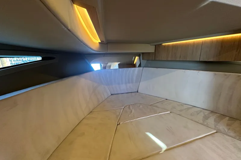  Yacht Photos Pics Luxurious interior cabin of 2025 NX Boats 370 with ambient lighting and plush seating.
